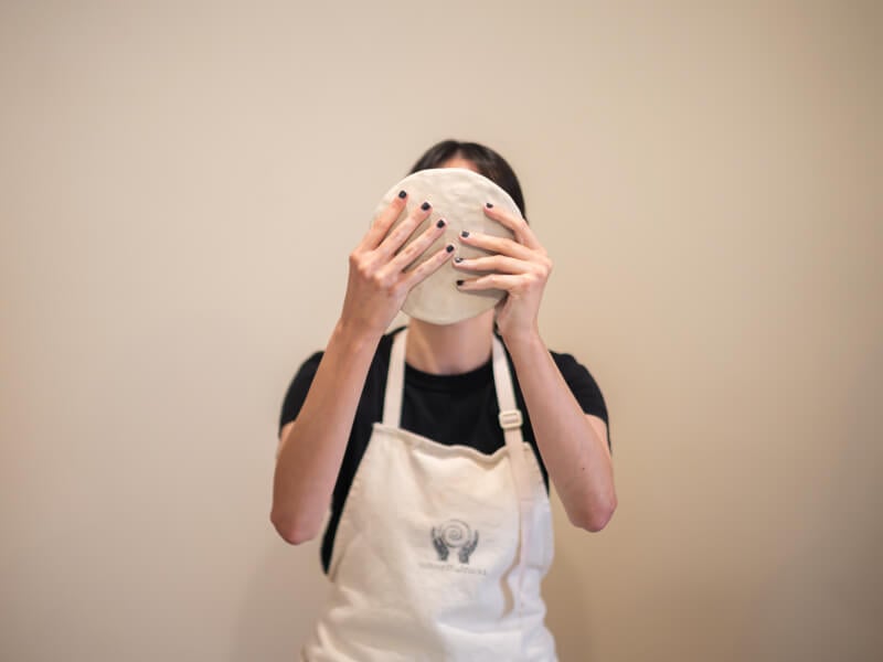 girl doing pottery